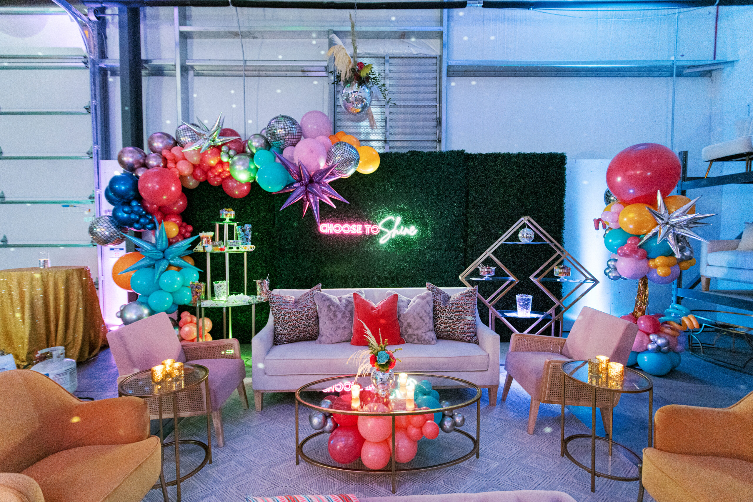 colorful lounge in front of green wall